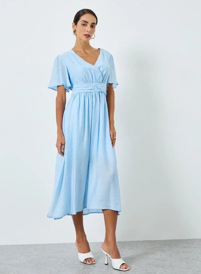 مكسيم كريشن تنورة ميدي قصيرة الأكمام بلون أزرق سماوي للنساء